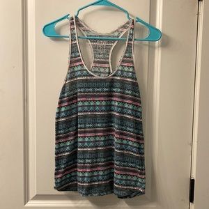 Distressed racer back tribal tank